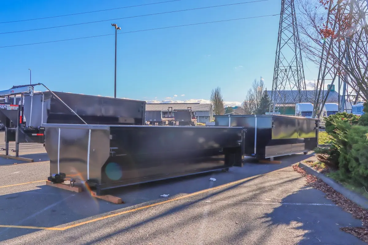 Roll-off dumpster ready for waste disposal at job site for Yard Waste Dumpster Rental in Helena Valley Northwest